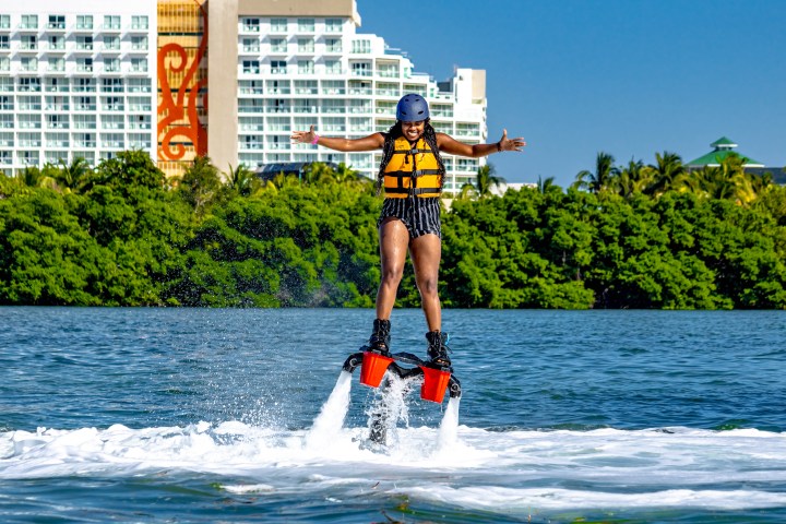 a man riding a surfboard in the water