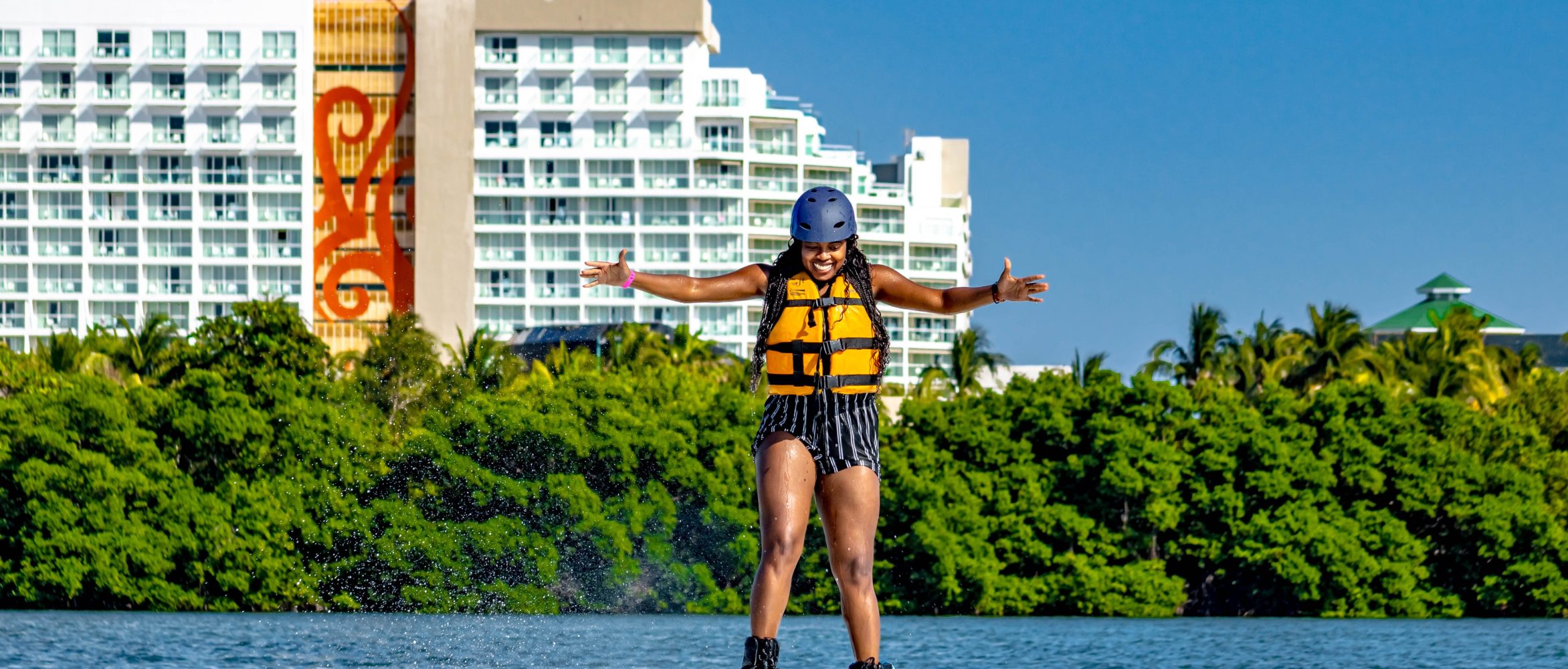 a man riding a surfboard in the water